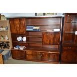 A reproduction mahogany wall unit