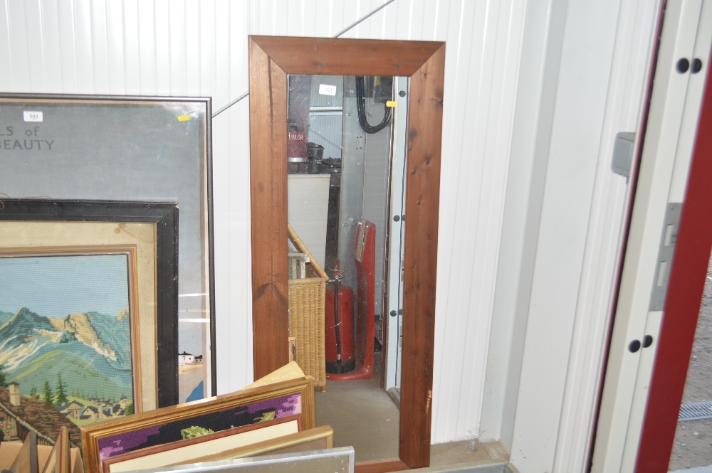 A pine framed oblong wall mirror