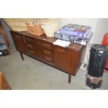 A retro style sideboard fitted three drawers