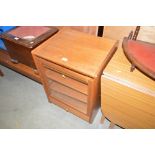 A teak record player cabinet