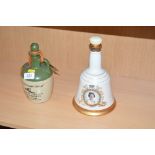 A Bells commemorative porcelain decanter; together