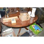 A reproduction mahogany extending dining table wit