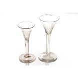 An antique wine glass, having tapering bowl, clear twist decoration to the stem and circular