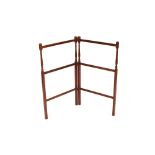 A Mahogany folding towel rail, on turned supports