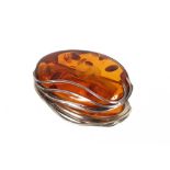 A large silver and amber brooch, appox. 6.5cm x 4cm