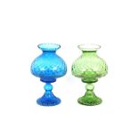 A green glass candle lamp with dimpled shade; and a blue glass similar (2)