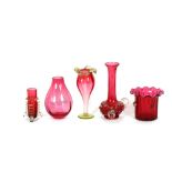 A cranberry glass beaker vase, having frilled rim and raised prunts decoration; a cranberry and