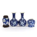 A pair of Chinese blue and white Hawthorn pattern baluster vases, under glazed blue character