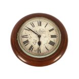 A late 19th Century oak cased circular wall clock, the painted dial inscribed K.R. Ingram,