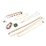 A collection of four simulated pearl necklaces, some with silver clasps; and other necklaces etc.