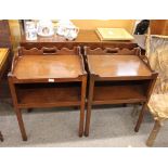 A pair of George III style mahogany tray top bedside cabinets, raised on chamfered square section