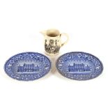 A cream ware Masonic baluster jug, decorated verse and symbols, 12cm high; and a pair of blue and