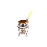 A Victorian small side pouring brandy saucepan, with gilded interior and turned ivory handle, London