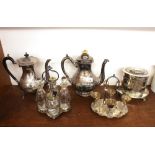 A plated baluster coffee pot, by Walker & Hall with presentation inscription; another similar with