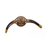 A fine quantity Victorian Memorial hair bracelet, with oval central piece containing a design of