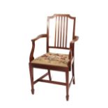 A set of five Edwardian mahogany and boxwood strung rail back dining chairs, four standards, one