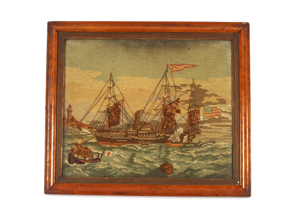 A Victorian wool work picture, depicting a paddle steamer and other boats approaching  a harbour,