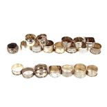 A collection of various silver napkin rings, 16oz