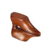 An antique treen shoe snuff box, 10cm long