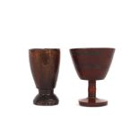 An 18th Century horn beaker, 3.4cm dia.; and another similar 3.5cm dia.