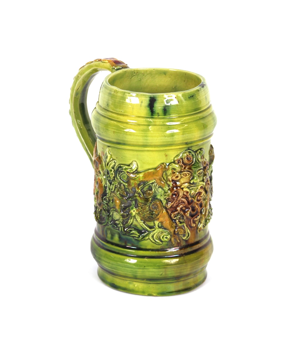 A 19th Century green glazed Castle Hedingham tankard, raised castle mark to base, stamped "E.Bingham