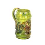 A 19th Century green glazed Castle Hedingham tankard, raised castle mark to base, stamped "E.Bingham