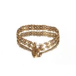 A 9ct gold bracelet, with cross decoration and padlock clasp, 17.8gms