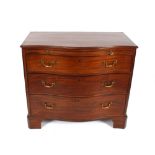 A 19th Century mahogany serpentine fronted chest fitted brushing slide and three long graduated