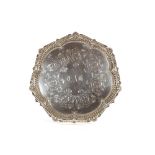 A late Victorian silver card tray, having shaped beaded and shell border, foliate engraved