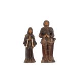A pair of pottery profiles, depicting Medieval figures 37cm in extremes, (some damage)