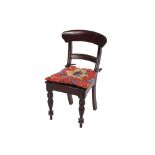 A 19th Century mahogany child's bar back standard chair, having solid seat raised on turned tapering