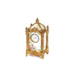 A 19th Century French gilt metal and porcelain panel carriage timepiece, the panels decorated