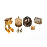 A white and yellow metal brooch, with Pietra Dura panel; a 9ct gold locket; a yellow metal brooch in