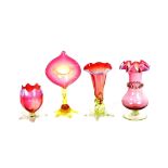 A cranberry green and Vaseline tinted Jack in the Pulpit vase, a small posy vase on clear glass leaf