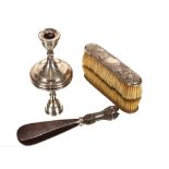 A silver mounted Art Nouveau design brush, London 1901; a silver handle shoe horn; and a dwarf