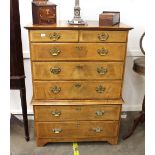 A 19th Century walnut tallboy chest, the upper section fitted two short and three long drawers,