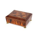 A 19th Century mahogany and specimen wood parquetry decorated sewing box, raised on brass bun