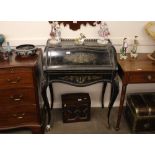 A 19th Century ebony and brass inlaid Bureau de Dame, the fall front opening to reveal a fitted