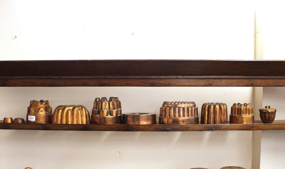 A collection of ten various antique copper jelly moulds