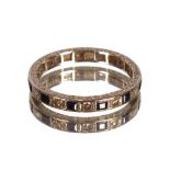 A white metal and sapphire diamond set eternity ring, approx. total weight 3gms