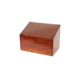An Edwardian mahogany stationery box, having sloping lid and partitioned interior
