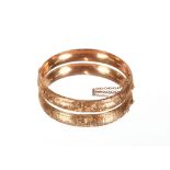 A 9ct gold snap bangle, approx. 11gms