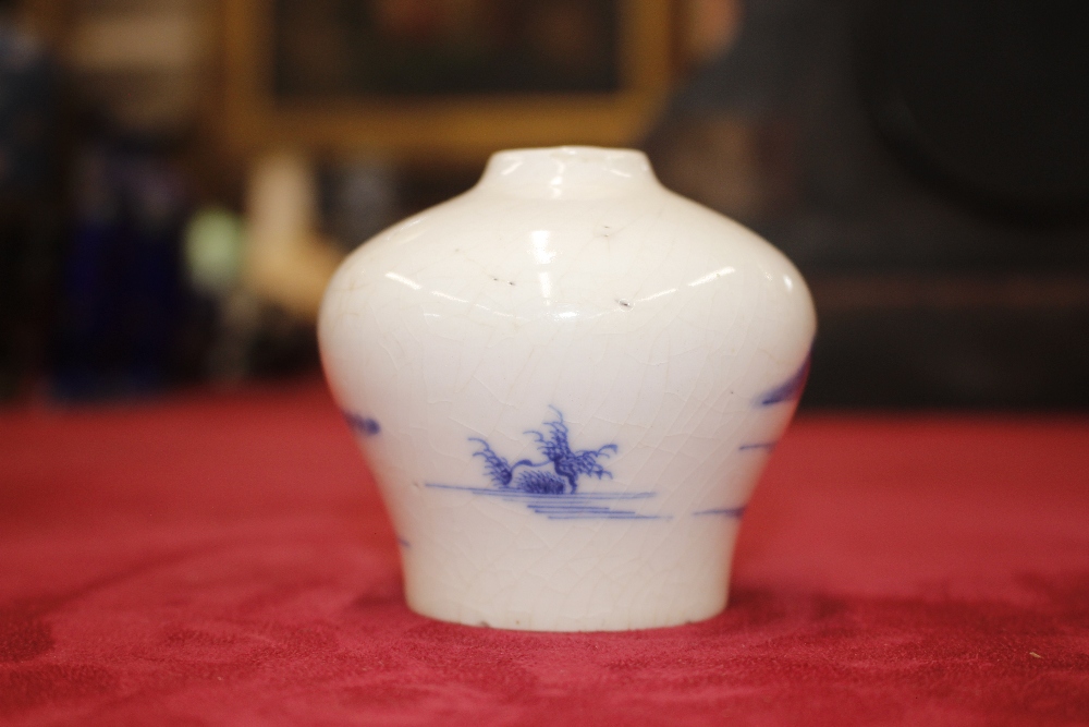 An Arita ware blue floral painted brush pot, decorated foliage and crickets; and a small Chinese - Image 3 of 11