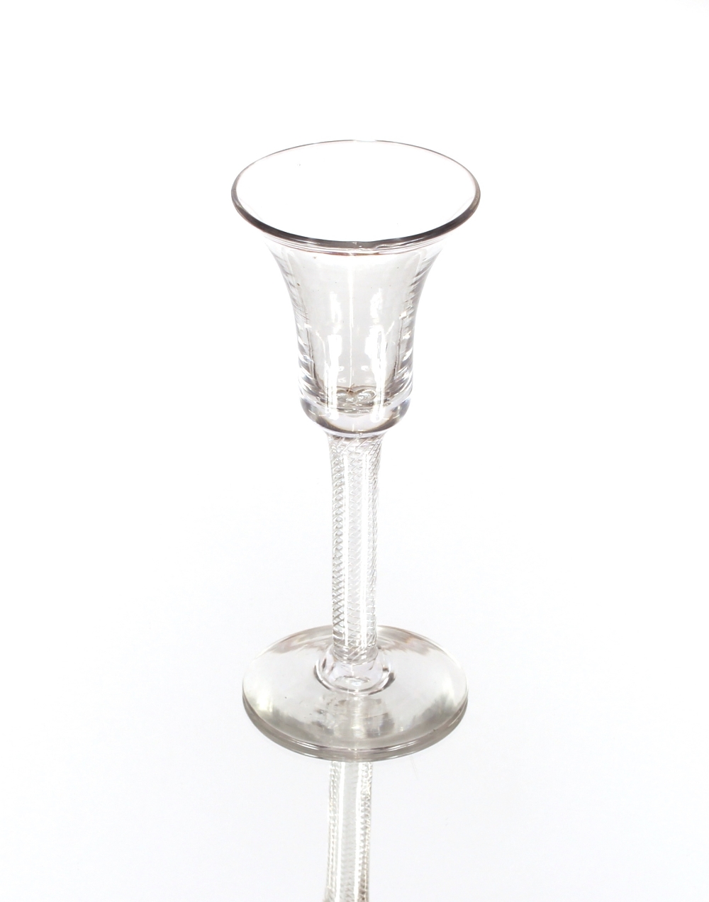 An antique wine glass, having bell shaped bowl and twist stem on circular spread foot, 16cm