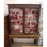 A 19th Century mahogany china display cabinet, in the Chippendale manner, the upper adjustable