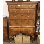 An 18th Century walnut chest, on stand, the upper section fitted three short and three long