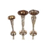 Three various silver trumpet shaped spill vases