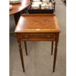 A pair of walnut and cross banded single drawer lamp tables, raised on turned tapering fluted