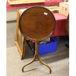 A 19th Century mahogany dished snap top occasional table, raised on turned column and tripod base,