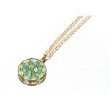 A Millefiori decorated pendant, hung to a yellow metal chain